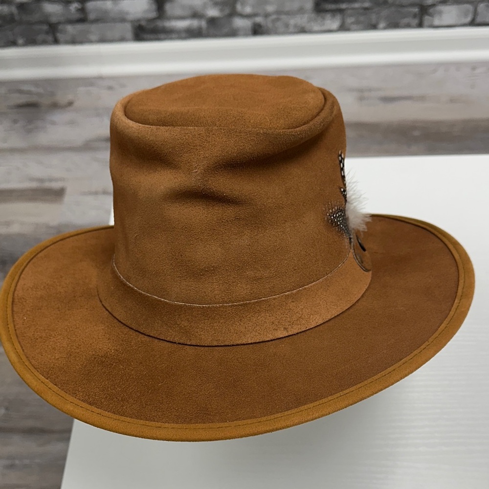 Stylish Brown Suede Hat with Feather Accent